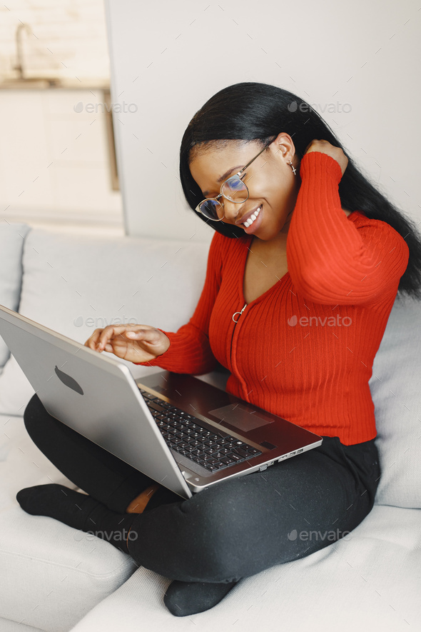 African woman spend time at home - Stock Photo - Images