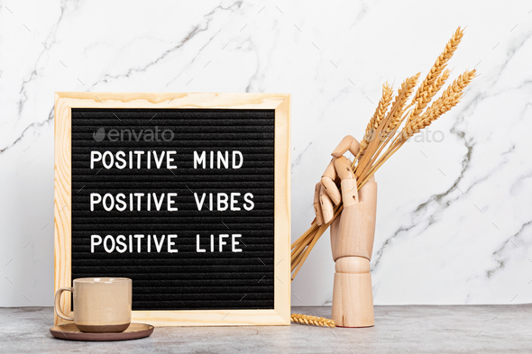 Positive mind, vibes, life motivational quote on the letter board. Inspiration text