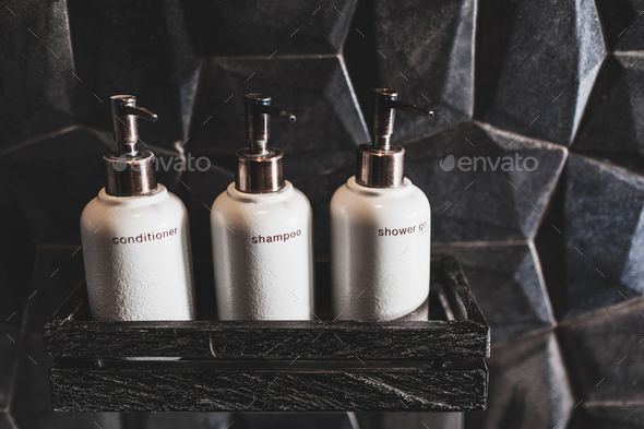 Download Three White Metal Bottles Of Shampoo Conditioner Shower Gel On Wooden Shelf Stock Photo By Olegbreslavtsev