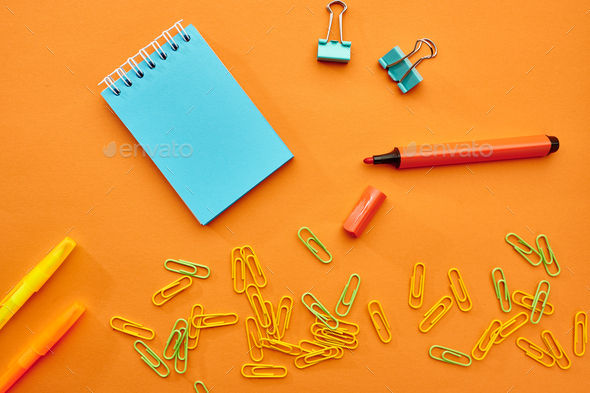 Clips, notepad and marker closeup, stationery