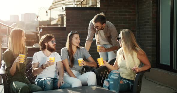 Friends Having Party on Terrace