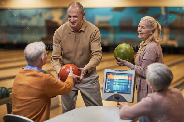 Senior People Enjoying Bowling