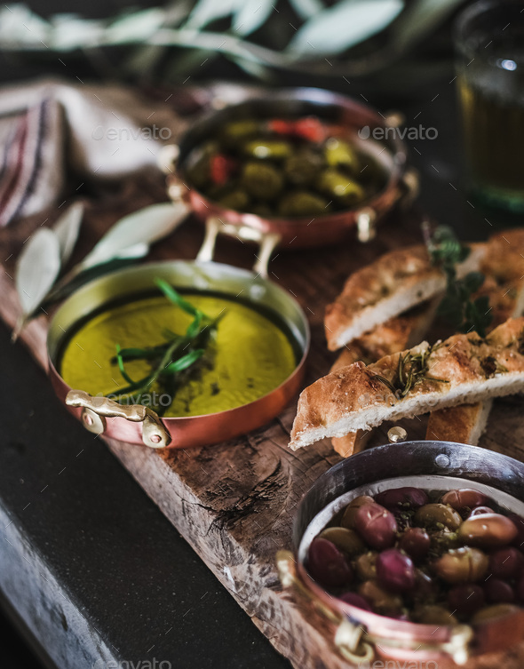 Traditional Mediterranean meze appetizers platter on wooden board - Stock Photo - Images