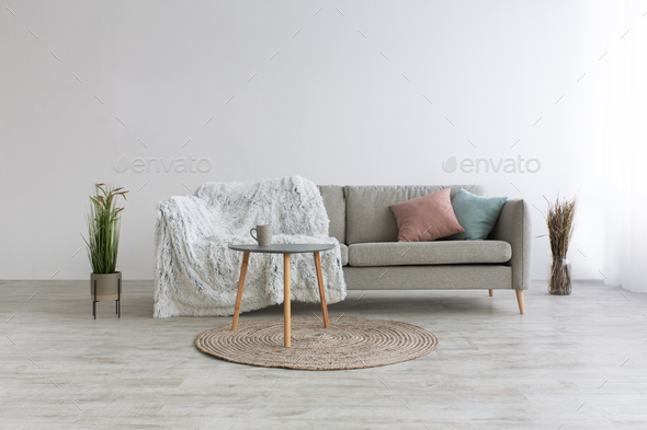 Minimalist simple modern flat design. Sofa with blue and pink pillows Stock  Photo by Prostock-studio