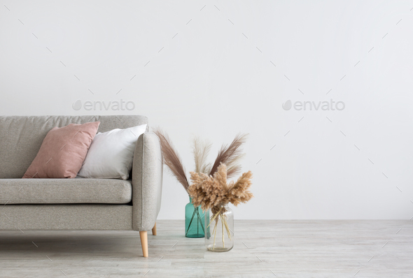 Minimalist simple modern flat design. Sofa with blue and pink pillows Stock  Photo by Prostock-studio