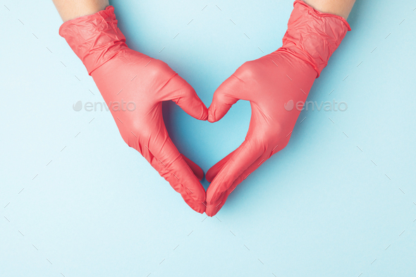 Doctor Hands in Red Gloves in Shape of Heart.