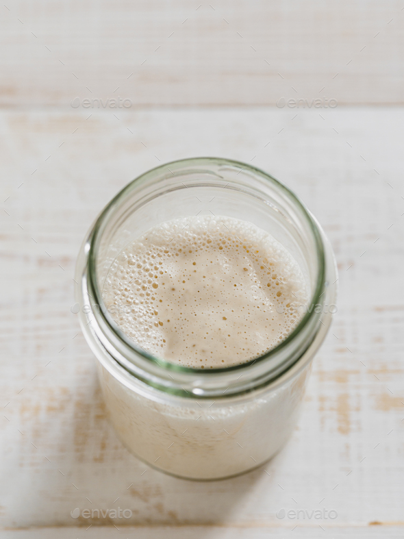 Wheat sourdough starter, top view, copy space - Stock Photo - Images