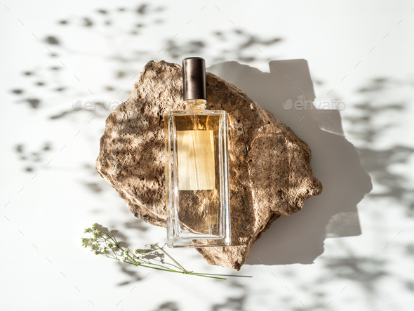 Mockup geometric shape stone podium and flowers - Stock Photo - Images