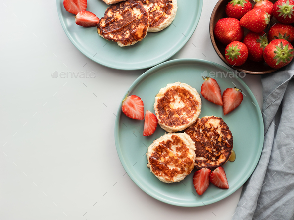 Cottage cheese pancakes, syrniki, ricotta fritters - Stock Photo - Images