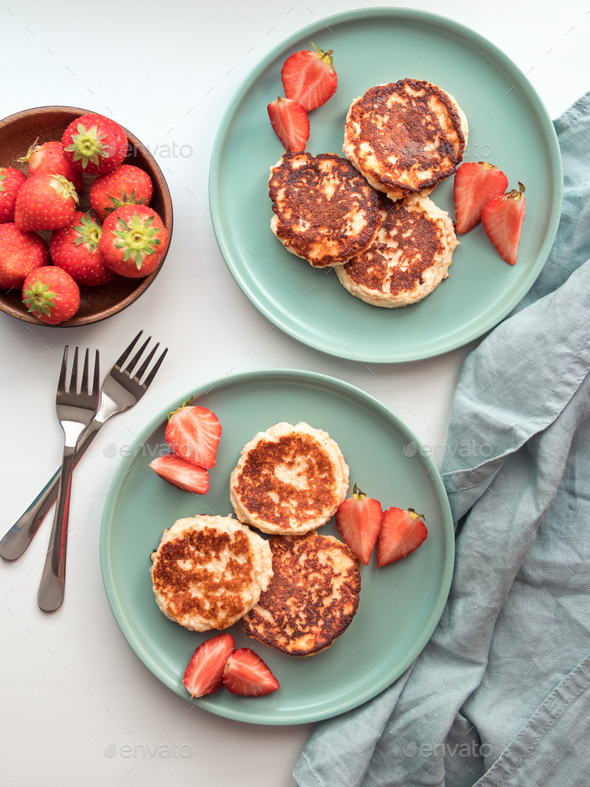 Cottage cheese pancakes, syrniki, ricotta fritters - Stock Photo - Images