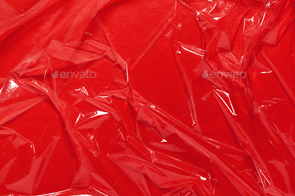 Wrinkled Cling Film, Red Vinyl Texture or Abstract Background.
