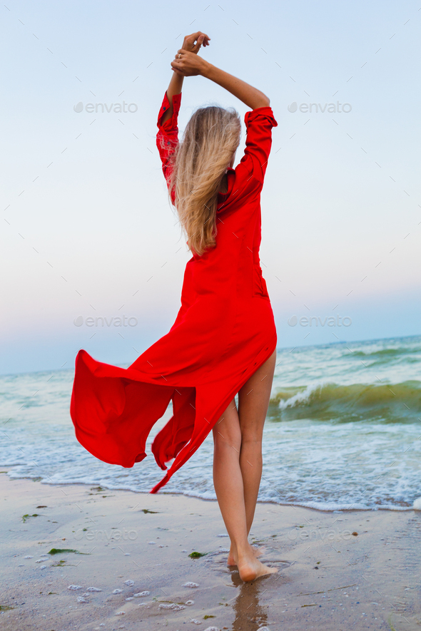 red dress on beach