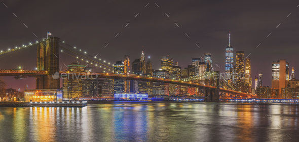 Panorama scene of New york Cityscape with Brooklyn Bridge over the east river - Stock Photo - Images