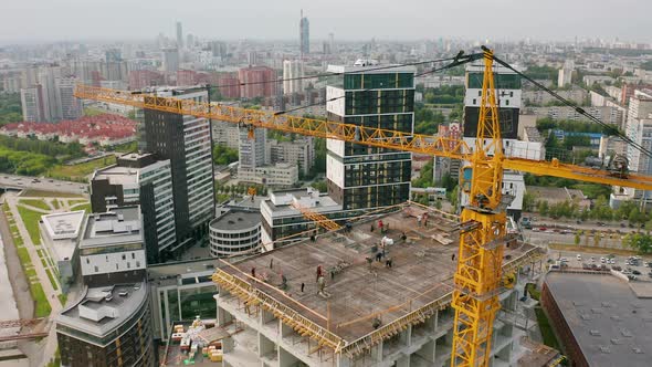 Tower Crane Works on Building Construction Site Multistorey Building Floor alt