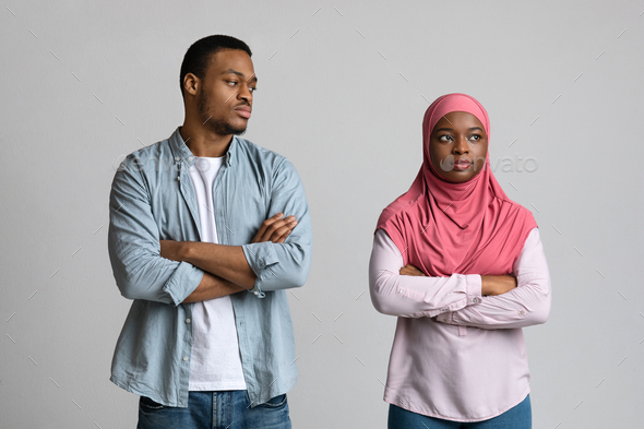 Frustrated black woman in hijab thinking about breaking up