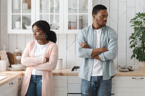 Relationship Crisis. Offended Young African American Spouses Standing In Kitchen After Quarrel