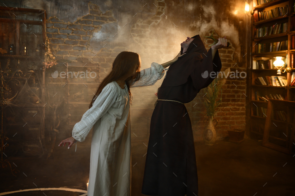 Exorcist casting out satan from young woman