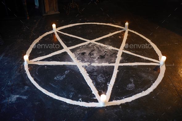 Magic circle with burning candles, nobody