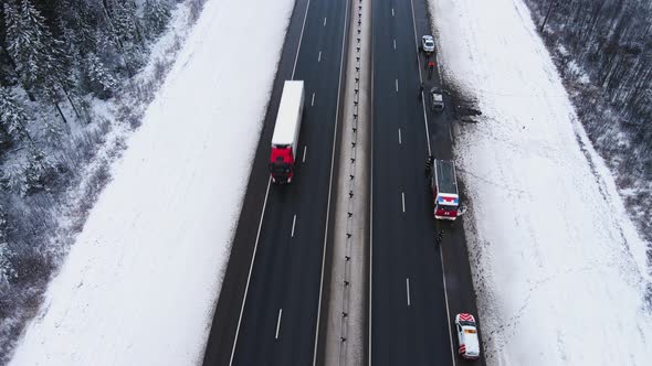 Accident  Burned Out Car on the Road Outside the City Aerial View alt