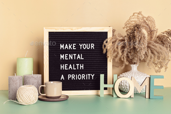 Make your mental health a priority motivational quote on the letter board. Inspiration psycological