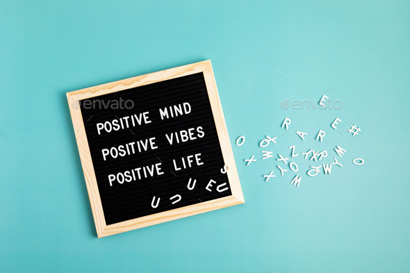 Positive mind, positive vibes, positive life motivational quote on the letter board. Inspiration