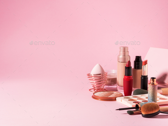 Cosmetics beauty products background with on pink Stock Photo by tenkende