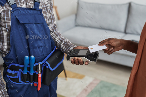 Woman Paying for Handyman Services