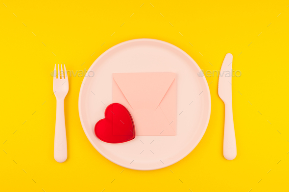 Pink letter on serving table. Romantic concept