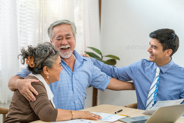 Asian couple grandparent are happy with insurance agency manager after deal the agreement successful