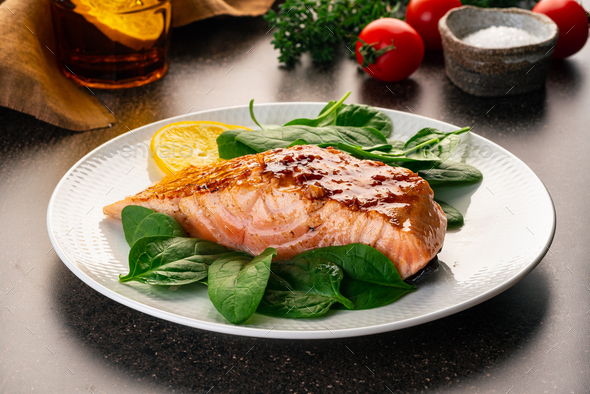 Baked or fried salmon and salad, Paleo, keto, fodmap, dash diet. Mediterranean food with steamed