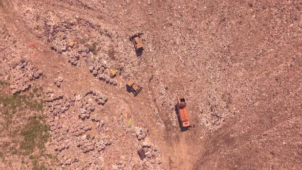 Bird's Eye View of a Garbage Dump Where Machinery Equals Mountains of Household Waste, Ukraine