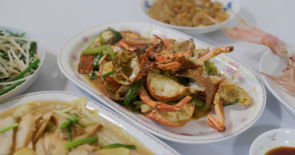 Steamed fish and lobster with roasted pork in chinese family homemade dinner