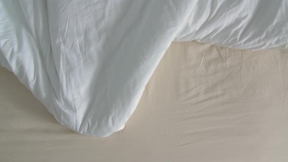 Feets Woman on Bed in Hotel Room or Bedroom Under Blanket Comfortable Resting alt