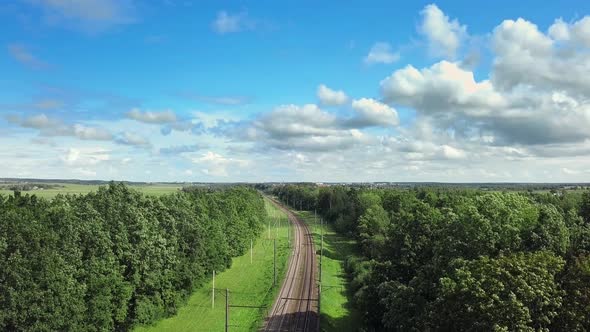 Train Way Through green grassed countryside, Aerial