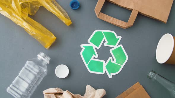 Green Recycle Symbol with Household Waste on Grey 16 alt