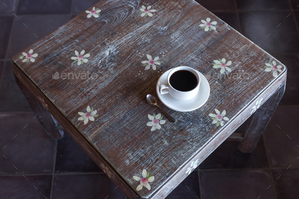 Black Coffee On Vintage Wooden Table With Flowers Ornament Stock Photo By Olegbreslavtsev