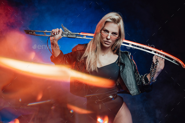 Caucasian woman posing with sword, Stock Photo, Picture And Royalty Free  Image. Pic. BIM-BLD152946 | agefotostock