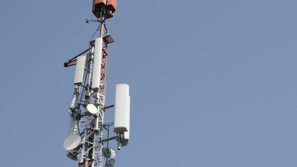 Telecommunication pannels on repeater antenna system  background 4K 3840X2160 UHD tilting footage -  alt