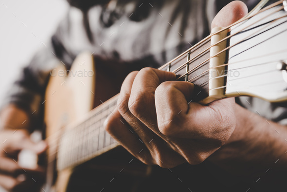 Close Up Of Man Hand Playing Guitar Stock Photo By Johnstocker Photodune