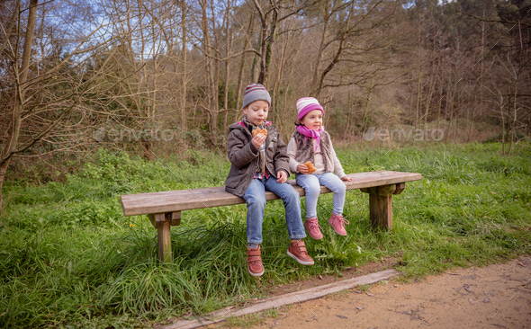 girl sitting down on bench