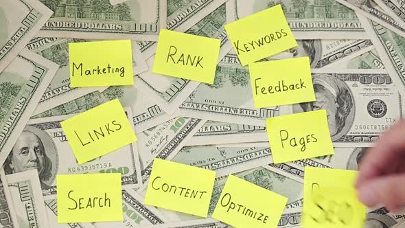 Seo Optimization Notes On The Money. Many Dollar Bills And Various Notes