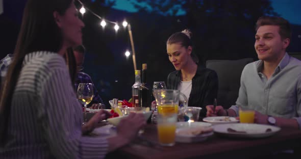 Man Cycling on the Machine Trainer He is Exercising in the Home