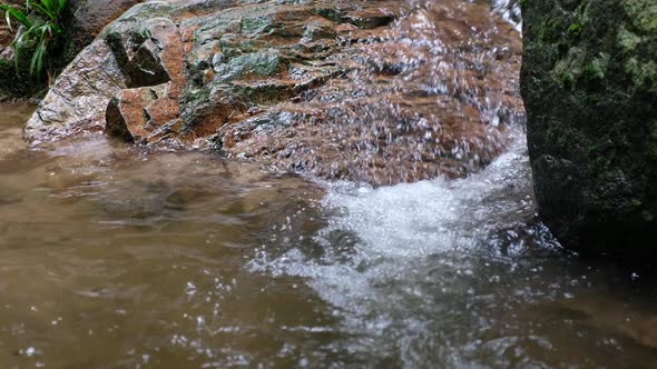 A beautiful waterfall stream in the tropical jungle