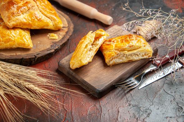 bottom view penovani khachapuri on wood board and on chopping board knife and fork rolling-pin on - Stock Photo - Images