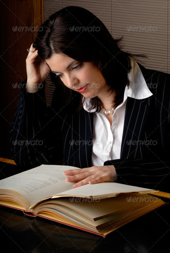 Woman Reading A Law Book