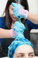 Professional Hairdresser Washes Female Head with Sapphire Hair Color After Hair Coloring Process - PhotoDune Item for Sale