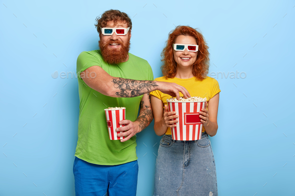 Positive couple come on late night film in cinema, eat delicious popcorn, become involved with inter