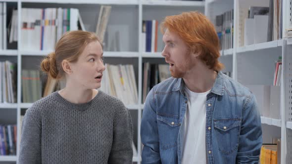 Astonished Young Man and Woman in Shock alt