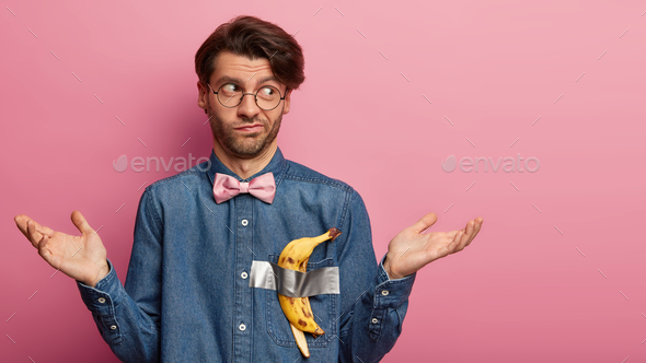 Unaware male takes part in popular flash mob with taped most expensive peeled and eaten banana, spre