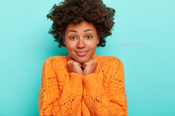 Horizontal view of cheerful curious surprised African American lady ...